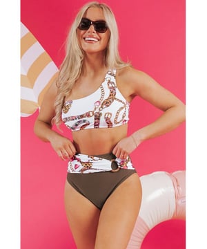 Our styles are designed with a trendy fitted look in mind following an international size standard. For the best fit we suggest choosing one size up from your usual. Be sure to check our sizing chart to find your perfect match!
  Khaki abstract print
  One
  shoulder top
  Ring
  linked design
  High
  waist bikini bottom for tummy control
  Asymmetric look with patchwork bottoms
  Bold patterns for a statement beach look
Material: 82% Polyamide 18% Elastane