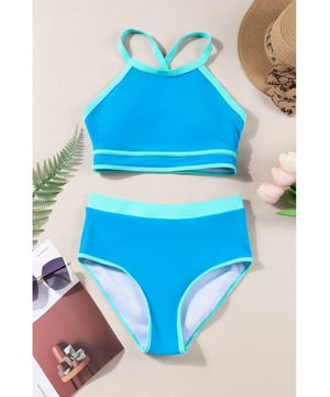Blue Contrast Trim Crisscross Back High Waisted Bikini
  Eye
  catching contrast trim
  Stylish crisscross back design
  Flattering high
  waisted silhouette
  Comfortable and supportive for all
  day wear
  Perfect for lounging by the pool or beach
Material: 82% Polyamide 18% Elastane