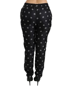 Merk: Dolce & Gabbana
  Conditie: Gloednieuw met tags
  Authenticiteit: 100% authentiek
  Stijl: Skinny broek met middelhoge taille
  Pasvorm: Slim fit
  Materiaal: 100% Zijde
  Kleur: Zwart gedrukt
  Details van het logo
  Herkomst: Gemaakt in Italie