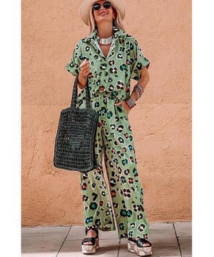 Green Leopard Print Short Sleeve Shirt and Wide Leg Pants Set
  Coordinated two
  piece set with mix
  and
  match possibilities
  Trendy leopard print for a bold and stylish touch
  Short sleeve shirt keeps you cool and chic
  Wide leg pants offer a trendy and flattering silhouette
Material: 100% Polyester