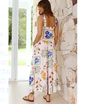 Our styles are designed with a trendy fitted look in mind following an international size standard. For the best fit we suggest choosing one size up from your usual. Be sure to check our sizing chart to find your perfect match!
  White Colorful Printed Square Neck Tank and Wide Leg Pants Set
  Square
  neck tank with wide straps
  Wide
  leg pants for a flowy silhouette
  Feminine floral design
  Soft comfortable fabric for all
  day wear
Material: 100% Viscose
