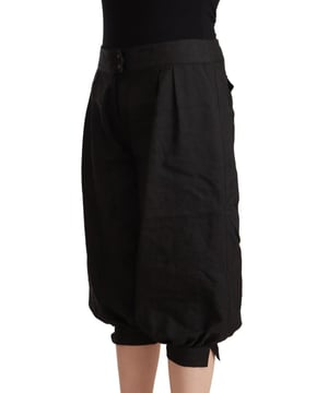 Merk: GF FERRE
  Model: Cropped harembroek
  Kleur: Zwart
  Rits
  en knoopsluiting
  Details van het logo
  Vervaardigd in Italie
  Materiaal: 48% Viscose 35% Polyester 12% Scheerwol 5% Metaal
