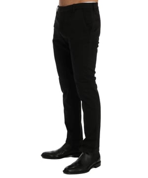 Brand: Costume National CNC
  Color: Black
  Fitting: Slim fit
  Two front pockets and two back pockets
  Zipper fly closure
  Logo details
  Material: 97% Cotton 3% Elastane