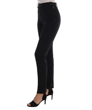 Brand new with tags
  Made in Italy
  Stirrup pants with a sleek black color
  Logo details for a touch of luxury
  Crafted from 90% polyester and 10% elastane
  Comfortable and flattering fit
Material: 90% Polyester 10% Elastan