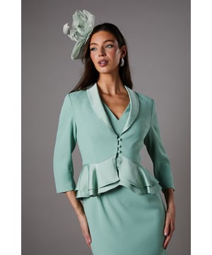 Exquisite tailored jacket crafted from satin back crepe fabric
Sophisticated peplum waist design adds a feminine flair
Structured shoulders and fitted silhouette create a flattering shape
Elegant V-neckline with button-up front closure
Versatile three-quarter length sleeves for effortless styling

This tailored jacket from Coast exudes refined elegance, making it a perfect choice for formal occasions like weddings, races, or graduations. The satin back crepe fabric drapes beautifully, while the peplum waist design adds a touch of femininity. Pair it with a tailored dress or trousers and heels for a polished and sophisticated look that will turn heads. Whether you're attending a garden party or a black-tie event, this jacket will ensure you radiate confidence and style.