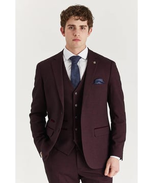 Step into refined elegance with this tailored wine suit jacket, featuring a timeless Prince of Wales check. The rich wine tone paired with a structured cut creates a confident and contemporary appearance, perfect for weddings, formal events, or standout office wear. Whether worn solo or with matching pieces, this blazer adds polish to any smart wardrobe.
Tailored fit blazer with structured, elegant finish
Classic Prince of Wales check in a deep wine tone
Suitable for formal events or stylish professional wear
Matches perfectly with coordinating trousers and waistcoat
Material: 77% Polyester, 20% Viscose, 3% Spandex