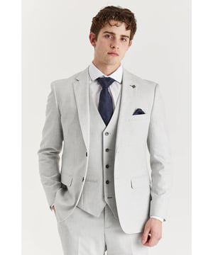 Stay sharp and comfortable in warm weather with this tailored Silver blazer, designed to deliver a clean, modern silhouette. The tailored fit ensures a flattering shape, while the breathable, lightweight fabric blend of polyester, viscose, and spandex offers all-day comfort. With its versatile Silver tone, this blazer easily pairs with a variety of outfits—whether you're dressing up for a formal event or aiming for a refined smart-casual look. The classic single-breasted design, complete with a notched lapel and button closure, adds timeless elegance to your wardrobe, making it a staple piece for any stylish man.
Tailored fit for a modern, flattering silhouette
Lightweight and breathable fabric perfect for summer
Neutral Silver colour pairs easily with different outfits
Classic single-breasted style with notched lapel
Suitable for weddings, office wear, and smart-casual events
Material: 78% Polyester, 19% Viscose, 3% Spandex