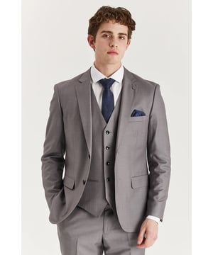 Make a sharp impression with this grey tailored suit jacket, crafted for a modern and polished look. Featuring classic stitch lapel detailing and a flattering structured cut, this blazer is ideal for formal events like weddings, summer gatherings, or proms. The neutral grey shade ensures effortless coordination with different shirts, trousers, or waistcoats, making it a versatile wardrobe staple.
Tailored fit blazer with subtle stitch lapel design
Sleek grey color for a modern and adaptable style
Suitable for both standalone wear or part of a 3-piece ensemble
Material: 78% Polyester, 19% Viscose, 3% Spandex