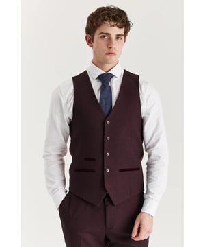 Elevate your outfit with this tailored wine waistcoat, detailed with a classic Prince of Wales check for added flair. Designed for a sharp fit and refined layering, it’s the perfect addition to your formalwear rotation. Ideal for weddings, proms, or even smart-casual looks when paired with jeans or chinos.
Smart tailored fit for a clean and polished silhouette
Elegant check pattern adds traditional charm
Rich wine hue for standout style
Wear alone or with the full 3-piece set
Material: 77% Polyester, 20% Viscose, 3% Spandex