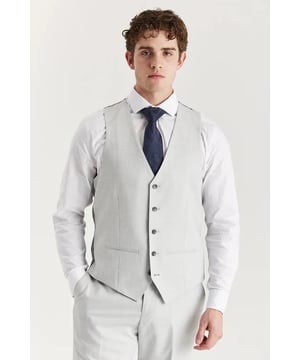 Elevate your formal and smart-casual attire with this classic Silver waistcoat, designed for both comfort and style. Crafted from a lightweight and breathable fabric blend, it’s ideal for summer events, offering ease of wear without compromising on elegance. The tailored fit ensures a sleek and flattering silhouette, while the versatile Silver tone pairs effortlessly with a variety of shirts, jackets, and trousers. With its traditional button-down front and single-breasted design, this waistcoat delivers timeless sophistication—perfect for weddings, proms, business occasions, or stylish layering.
Tailored fit for a sleek, modern look
Lightweight and breathable fabric ideal for warm weather
Neutral Silver colour pairs well with many outfits
Classic single-breasted design with button front
Suitable for weddings, formal events, or smart-casual wear
Material: 78% Polyester, 19% Viscose, 3% Spandex