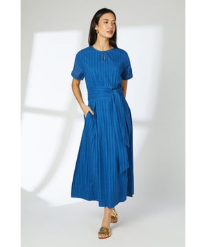Elegant midi dress featuring a distinctive tie waist detail that creates a flattering silhouette
        Crafted from pure cotton fabric with a subtle striped texture throughout
        Feminine pleated skirt design adds graceful movement and dimension
        Practical side pockets for everyday convenience
        Delicate keyhole detail at the crew neckline adds a refined touch
    
    This Principles midi dress combines timeless style with everyday comfort. The pleated design creates beautiful movement as you walk, while the tie waist detail accentuates your figure with adjustable definition. Perfect for summer daywear, style with flat sandals and a woven tote for farmers' markets and weekend brunches, or dress up with espadrille wedges for garden parties. The breathable cotton construction ensures all-day comfort even during warmer weather. For cooler evenings, layer with a lightweight cardigan or denim jacket for a relaxed yet put-together look. The versatile design transitions effortlessly from casual family gatherings to alfresco dining with friends, making it a wardrobe essential for the season.
