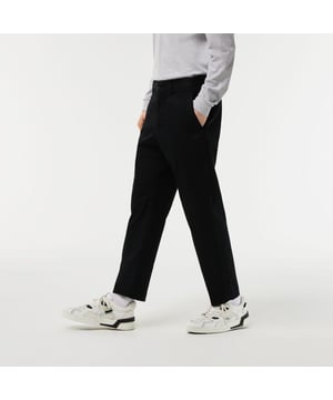 Heren stretchkatoen skinny chino's Tapered fit Gabardine van organisch stretchkatoen Gulp met rits, knoop en riemlussen Zijzakken ticketzak en achterzakken inclusief een knoopzak Krokodillenlabel op achterzak