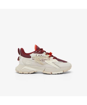 Women's Lacoste L003 Neo Tech Sneakers- Premium mixed upper including canvas  nylon  leather and mesh- Heel lacing detail inspired by the original L003- Lacoste Active branding printed on centre panel- Textured  robust  high-grip rubber outsole- Signature crocodile printed on tongue and heel counter- Ref: 48SFA0087OW9