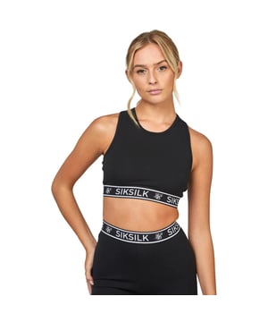 92% Katoen, 8% Elastane. Stof: Zachte aanraking. Ontwerp: Logo, Tape. Rugstijl: Racerback. Gemaakt van gerecycleerde materialen. Hals: Ronde Hals. 8 UK: 32 in. 10 VK: 33 in. 12 VK: 35 in. 14 VK: 37 in.