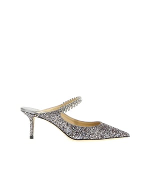 - Zusammensetzung: 100% Stoff - Innen: Leder - Innensohle: Leder - Sohle: Leder - Spitz zulaufende Zehen - Absatzhöhe 6,5 cm - Offene Ferse - Kristallverzierung - Schlupfdesign - Rundum glitzernd - Obere Juwelenriemen - Hergestellt in Italien - Geschlecht: DAMEN -