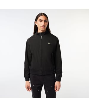 BH0538 Men's Lacoste Water-Repellent Light Twill Jacket Two exterior pockets and two interior pockets Check pattern lining Buttoned collar Embroidered crocodile on chest Twill Men's Lacoste Water-Repellent Light Twill Jacket Two exterior pockets and two interior pockets Check pattern lining Buttoned collar Embroidered crocodile on chest Twill