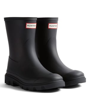 Introducing the Downpour Short Boot, with a sleek upper design and moulded lightweight rubber construction, this boot is finished with our heritage top binding. The unique tread allows for outsole traction when walking.