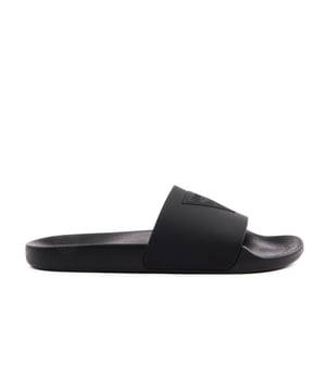 Guess Tokyom Herren Pantoletten Schwarz Synthetik. Authentischer Schuh der Marke Guess - Streetwear/Sportswear Design von Guess - Guess für modebewusste Männer, perfekt für den Alltag - Die schwarzen Guess Pantoletten lassen sich ideal mit dem Rest Ihrer Garderobe kombinieren - Bequeme Synthetikmaterial - Klassische Schnalle - Tokyom - Synthetik