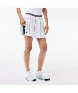JF0990 Piqué Sportrok met Geïntegreerde Shorts Gerecycled polyester gemaakt van productieafval Lengte: 37 cm vanaf taille Sneldrogend Getest door professionele spelers Siliconen krokodil op voorkant Piqué Sportrok met Geïntegreerde Shorts Gerecycled polyester gemaakt van productieafval Lengte: 37 cm vanaf taille Sneldrogend Getest door professionele spelers Siliconen krokodil op voorkant