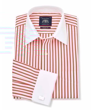 This men's contrast collar shirt is cut to a classic fit shape, and crafted from luxurious 100% BCI smooth cotton poplin that's both soft and easy to iron. Whether you’re dressing up for work, a wedding or a business trip, pair it with a navy suit and your favourite cufflinks for a timeless, refined ensemble that speaks volumes about your impeccable taste. Generously proportioned classic fit with contrast white curl resistant Windsor collar, with an integral and removable collar stay, chest pocket and elegant double cuffs.