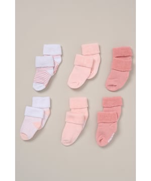 Keep little feet cosy and comfy with this 6-pack of terry baby socks from DKNY. Made from a soft cotton blend with added stretch, they’re gentle on delicate skin and designed to stay put during playtime or nap time. A practical everyday essential for the spring/summer season.
