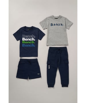 This versatile set from Bench includes two soft 100% cotton tees paired with brushed sweat shorts and joggers - perfect for mixing and matching across the week. The elasticated ribbed waistband and flat cotton drawcord offer a comfy, adjustable fit for play or downtime. A practical duo for effortless outfit changes through spring and summer.