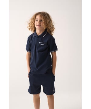 This easy set from Bench includes a ribbed polo shirt and matching shorts made from soft cotton with a bit of stretch for comfort. The ribbed texture gives it a nice finish while still being comfortable to wear. A great choice for everyday wear or casual outings.