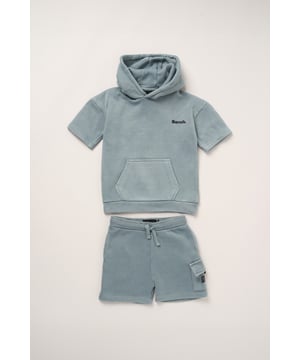 This casual 2-piece set from Bench includes a short sleeve hoody and coordinating shorts, crafted from soft brushed sweat fabric for breathable comfort. The double-lined hood and stretch ribbed finishes deliver a relaxed, sporty vibe with added durability. Perfect for everyday wear, from chilled weekends to active play.