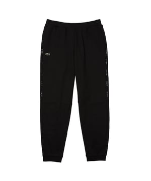 83% Katoen, 17% Polyester. Ontwerp: Geborduurd logo, Effen. Zakken: 2 Zijzakken. Waistline: Elastiek. Pasvorm: Relaxed model. Manchet: Elastiek.