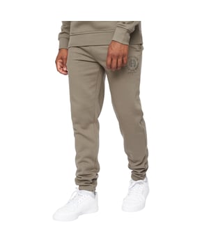 65% Baumwolle, 35% Polyester. Gewebe: angerautes Material. Design: Tintendruck, Logo, Aufschrift. Zum Überziehen. Hi-Build. Taschenart: Zwei Seitentaschen. Taille: Elastisch. Bündchen: Elastisch.