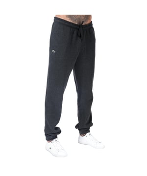 87% Baumwolle, 13% Polyester. Futterstoff: Fleece. Design: Gesticktes Logo, Unifarben. Taschenart: Zwei Seitentaschen. Taille: mit Kordelzug, Elastisch. Bündchen: Elastisch.