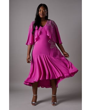 Stunning midi dress featuring intricate hand-stitched embellishments and delicate glass beads
        Elegant cape sleeves create a dramatic silhouette with graceful movement
        Flattering V-neckline frames the dcolletage beautifully
        Flowing midi length with a feminine flared hem for a sophisticated finish
        Butterfly motif detailing adds a touch of whimsical charm to this occasion piece
    
    Make an unforgettable entrance at your next special event in this exquisitely crafted Coast midi dress. The showstopping cape sleeves create a graceful drape whilst the hand-stitched embellishments catch the light with every movement. The V-neckline and flowing silhouette work in harmony to create a figure-flattering shape that moves beautifully. Perfect for weddings, the races or formal gatherings, this dress requires minimal accessorising-simply pair with metallic strappy heels as shown and delicate jewellery to complement the intricate beadwork. The butterfly detailing adds a distinctive touch to this sophisticated piece, ensuring you stand out for all the right reasons. This dress transitions effortlessly from daytime celebrations to evening affairs, offering versatility alongside undeniable elegance.