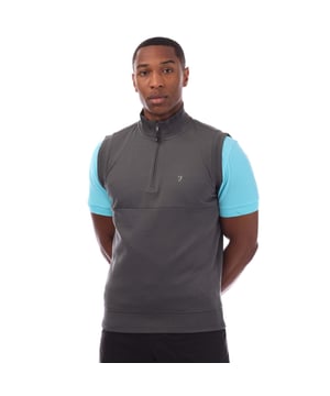 Mens Farah Clint Midlayer Gilet in grey.- High neck  ribbed collar.- Sleeveless.- Zip closure.- Ribbed hem.- Inner rib detailing.- Raised textured FARAH 'F' on left chest.- Farah Golf flag tab signature.- Textured fabric.- 54% Cotton  46% Polyester.- Ref: FHTOP1059GRY