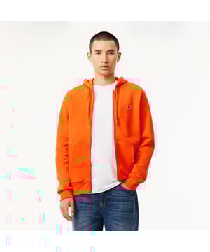 Zip-Up Fleece Hoodie Organic brushed cotton and recycled polyester Classic fit for natural ease Kangaroo pocket Jersey-lined hood Embroidered crocodile on chest