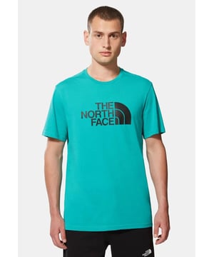 The North Face Mens Short Sleeve Easy Tee.     
Pressed Plastisol Print at Front.     
The North Face Logo on the Back of the Shoulder.     
Classic Length Short-sleeve T-shirt With Crew Neck.      
100% Cotton.     
Machine Washable (Please See Care Label).     
The North Face Mens T Shirt TNF Short Sleeve Crew Neck Cotton Casual Easy Tee.