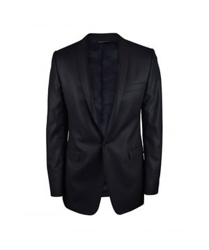 Traje Dolce Gabbana de dos piezas en negro con finas rayas grises.Chaqueta con bolsillos laterales y un bolsillo en el pecho.Cierre principal con un botón.Botones en las mangas.Ligera abertura en la espalda.Pantalón con cierre de cremallera y botón.Bolsillos laterales en los pantalones.Bolsillos traseros con botón.Trabillas para cinturón.55% poliéster y 45% lana.Made in Italy.