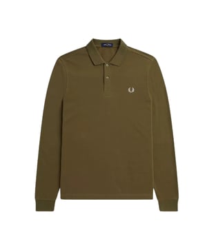 Elegante y versátil, este polo de manga larga de Fred Perry luce la icónica insignia de Fred Perry en el pecho izquierdo y está confeccionado en 100 % algodón. Perfecto para cualquier ocasión, es una prenda atemporal que nunca pasa de moda. Con su material de alta calidad y su diseño impecable, es una prenda imprescindible para cualquier persona a la moda