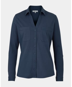 Crafted from a durable cotton jersey fabric that's oh-so smooth, this women's shirt is the ideal semi-formal option. Versatile enough to wear with a wide range of trousers, skirts and jeans, it comes complete with two chest pockets and long sleeves that can be rolled up and secured with a tab fastening. 100% cotton jersey. Smooth soft cotton jersey. Lily Of The Row branding. Semi fitted shape with straight hem. Long Sleeve with tab for rolling up and securing. Two patch pockets on the chest. Neat collar with open neck. Centre back length on a size 10 is 69cms. Machine washable at 40°C