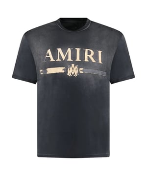 Upgrade your style and stand out with the AMIRI MA Bar Applique Black T-Shirt! Crafted from premium 100% cotton, this iconic tee boasts the brand's distinctive bar applique, bringing edgy flair to your outfits. You'll love the bold statement this shirt makes, and you'll never want to part with it!