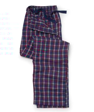Experience the ultimate in comfort with our red, navy and white check lounge pants. Made from 100% cotton that’s been brushed for cosiness, they are luxuriously soft, wrapping you in luxury warmth perfect for lazy days at home or working from home. 100% pure brushed cotton, warm, soft and cosy. Fully elasticated waist with contrast herringbone. One pocket at the back with embroidered logo. Inside leg on a size Medium is 31" / 79cm. Presented in fully recyclable packaging.