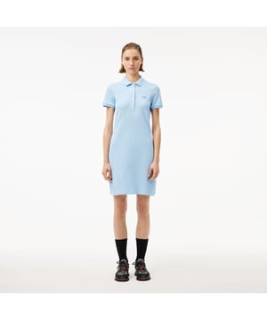 Slim Fit Stretch Piqué Polo Dress Stretch katoen piqué Slim fit Geribbelde afwerking op kraag en mouwen Echte parelmoeren knopen Geborduurde krokodil op de borst
