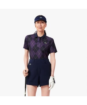 Womens Lacoste SPORT Regular Fit UV Protect Golf Polo Shirt in navy blue - purpleThis Lacoste polo shirt is designed for expert golfers  featuring Ultra Dry technology and UPF50+ protection. With a print inspired by the Lacoste archives for added croco-style. We'll handle the look; you handle the swing.- Recycled polyester made from manufacturing offcuts- Regular fit  straight cut- Polo collar- Tested by golf professionals- UPF 50 UV protection- Silicone crocodile on chest- Main fabric: Polyester (94%)  Elastane (6%) - Collar: Polyester (98%)  Elastane (2%).  Machine washable.- Ref: PF7453-IEK