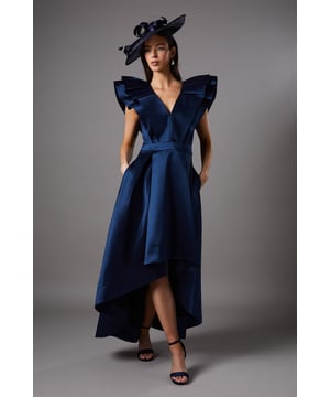 Exquisite frill sleeves add a touch of drama to this elegant midi dress
Flattering V-neckline elongates the silhouette
Crafted from twill fabric for a luxurious look and feel
Dipped hem creates a striking asymmetric finish
Concealed back zip fastening for a seamless fit

Radiate sophistication at your next formal event in this stunning midi dress from Coast. The frill sleeves and V-neckline exude a refined femininity, while the dipped hem adds a contemporary twist. Style with sleek heels and a clutch for a polished ensemble that will turn heads at weddings, races, or any other special occasion.
