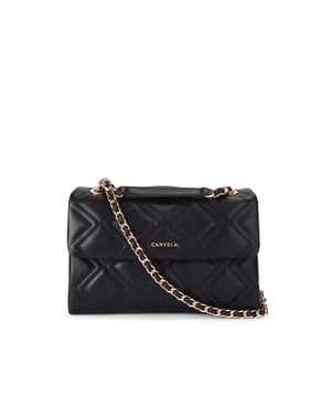 The Carvela Large Rosa Chain shoulder bag features a black exterior with overstitch quilting in a diamond design. There is gold tone branding on the front and hardware details across the bag. Dimensions: 17cm (H), 26cm (L), 7cm (D). Strap length: 63cm.