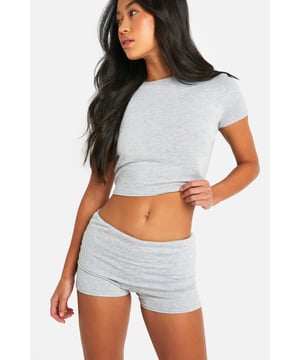 Ultra-soft micro-shorts for ultimate comfort
        High-waisted design for a flattering silhouette
        Seamless construction to prevent chafing
        Stretchy fabric for unrestricted movement
        Matching crop top for a coordinated loungewear set
    
    Embrace laid-back luxury with these loungewear micro-shorts from Boohoo. Perfect for those lazy days at home or casual weekends, these shorts offer both style and comfort. The high-waisted design creates a sleek silhouette, while the ultra-soft fabric feels like a dream against your skin. Pair with the matching crop top for a coordinated look that's both chic and cosy. Whether you're binge-watching your favourite series, doing some light yoga, or simply relaxing with friends, these versatile shorts are your go-to choice. The stretchy material allows for easy movement, making them ideal for impromptu dance sessions in your living room or reaching for that last biscuit on the top shelf. Add a oversized cardigan for those chilly evenings, or wear them on their own when the temperature rises. These micro-shorts are the epitome of effortless style, proving that staying in can be just as fashionable as going out.