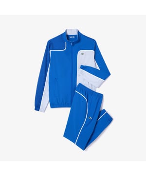 WH7573 Tennissportpak Colourblock Gerecycled polyester gemaakt van snijafval Regelmatig licht getailleerd model bovenop Regelmatig recht gesneden broek Siliconen krokodil op de borst Tennissportpak Colourblock Gerecycled polyester gemaakt van snijafval Regelmatig licht getailleerd model bovenop Regelmatig recht gesneden broek Siliconen krokodil op de borst