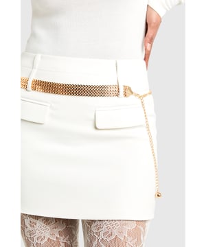 Chunky chain-link design for a bold statement
        Adjustable length with sliding clasp
        Wide, eye-catching metallic band
        Versatile accessory for various outfits
        Secure fastening for comfortable wear
    
    Make a striking impression with this chunky chain-link belt that's sure to turn heads. Perfect for adding a touch of glamour to your night-out ensemble, this bold accessory effortlessly combines style and functionality. The wide metallic band creates a dramatic focal point, instantly elevating any look from basic to brilliant. Adjust the length with ease using the sliding clasp, ensuring a perfect fit for high-waisted trousers, skirts, or over a sleek dress. Whether you're hitting the dance floor or enjoying cocktails with friends, this versatile piece adapts to various outfits and occasions. Pair it with a crisp white mini dress for a chic contrast, or use it to cinch in an oversized blazer for a fashion-forward silhouette. This Boohoo belt is the ultimate accessory for the trendsetting young woman who isn't afraid to stand out in the urban nightlife scene.