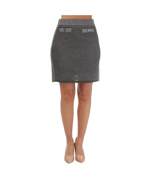 40% viscose, 24% polyamide, 24% polyester, 12% gemetalliseerde vezels. Stof: Gebreid. Ontwerp: Nepzak.
