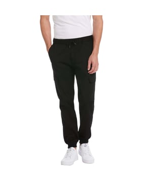 Polyester. Gewebe: Stretch, Twill. Design: Unifarben. Gewebetechnik: Flexibel, Leicht. Bündchen am Knöchel. Taschenart: Zwei Seitentaschen, Zwei Cargotaschen, 2 Taschen hinten, Klappenverschluss. Taille: mit Kordelzug, Elastisch. Passform: Schmal zulaufend.