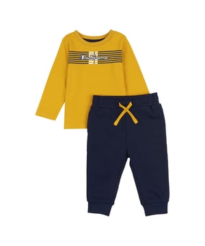 Top: 100% Cotton Bottom: 60% Cotton 40% Polyester. Ben Sherman Toddler Over The Head Hoodie featuring high build print across chest finished with contrast sleeve and hood lining with matching Jogger